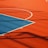 A vibrant sports court with sections of red and blue, featuring crisp white lines marking the boundaries. Shadows from a structure create geometric patterns across the surface, adding depth and interest to the scene.